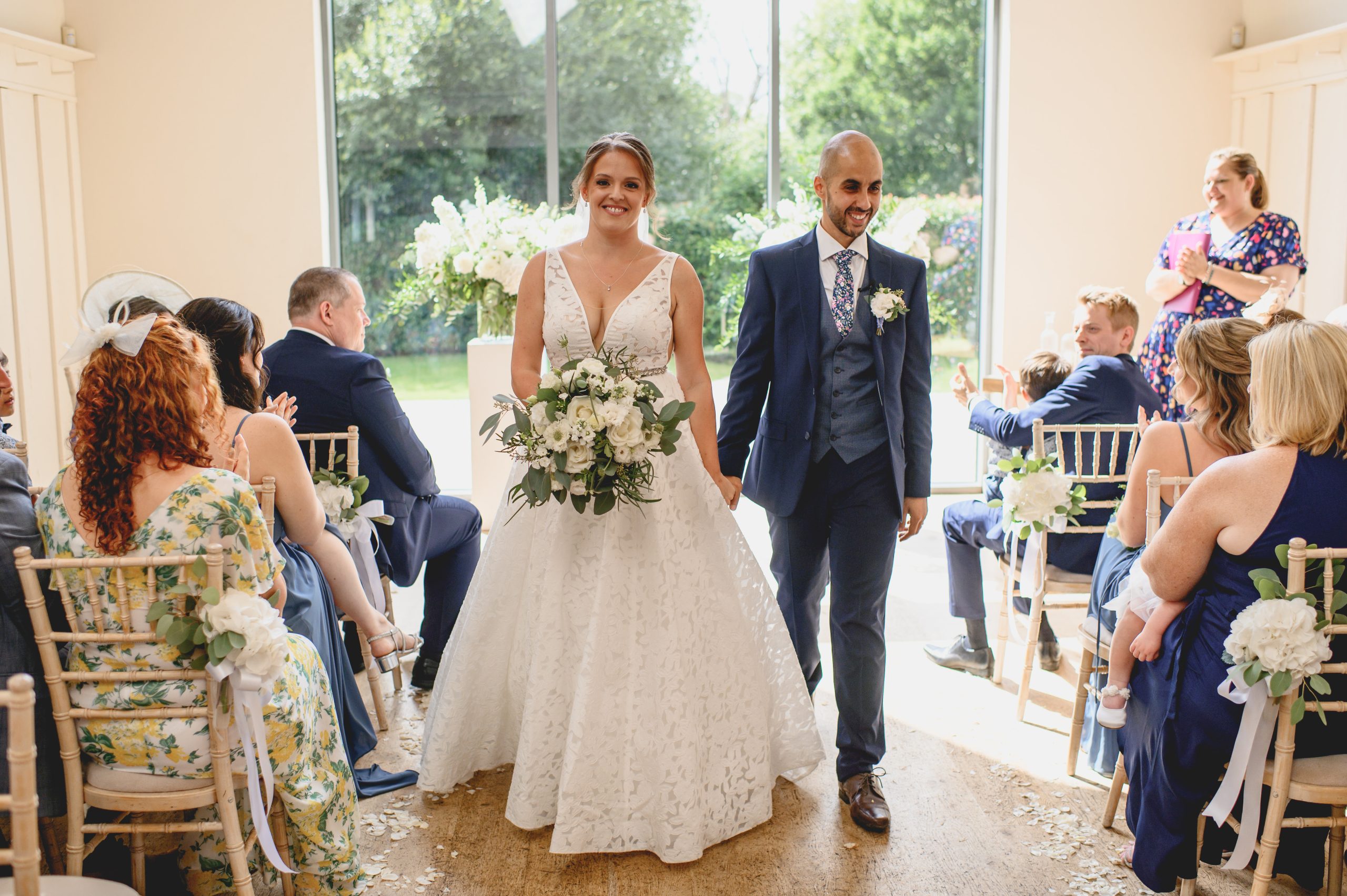 Bride and groom walking together.