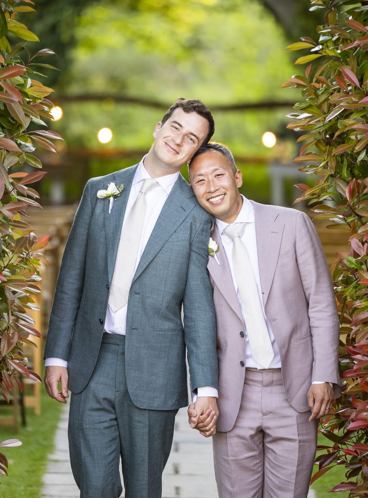 Surrey wedding - two men holding hands