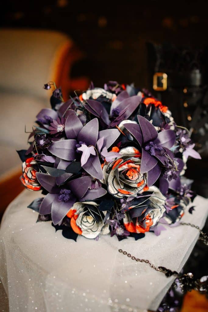 Vibrant bouquet of purple and red flowers.