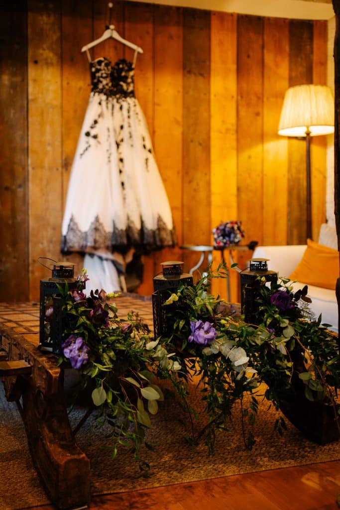 Elegant wedding dress with floral decorations.