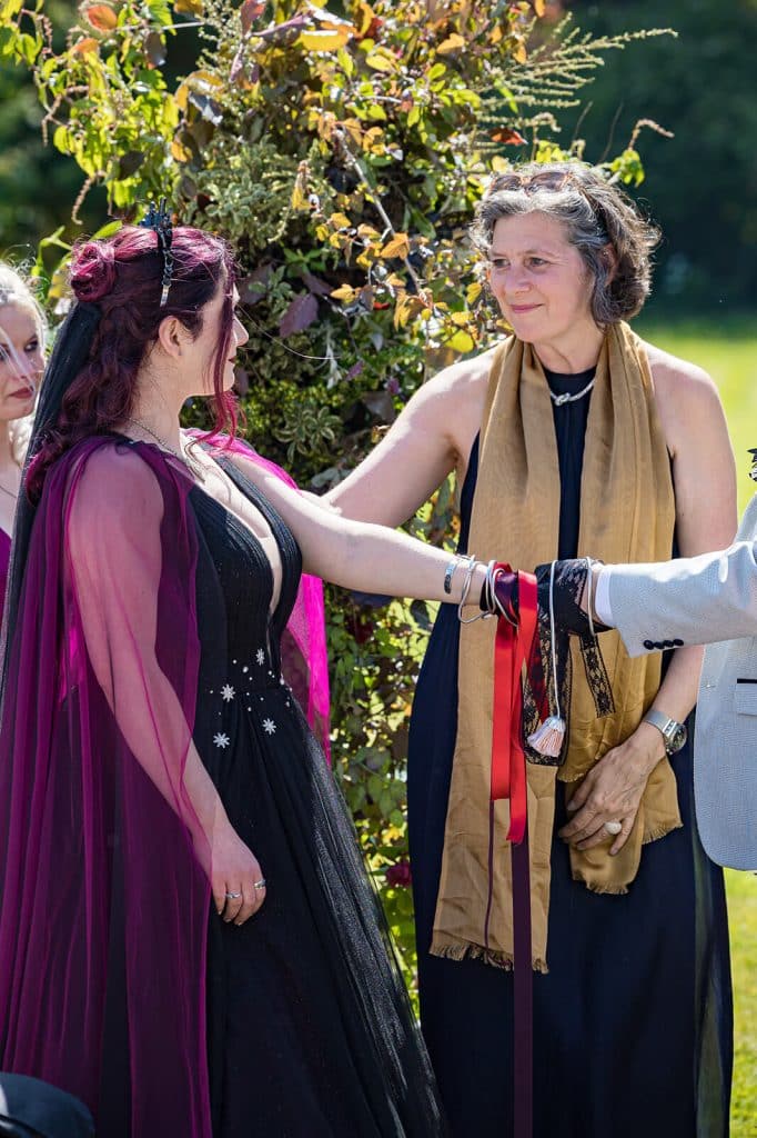 Two women interacting at an event