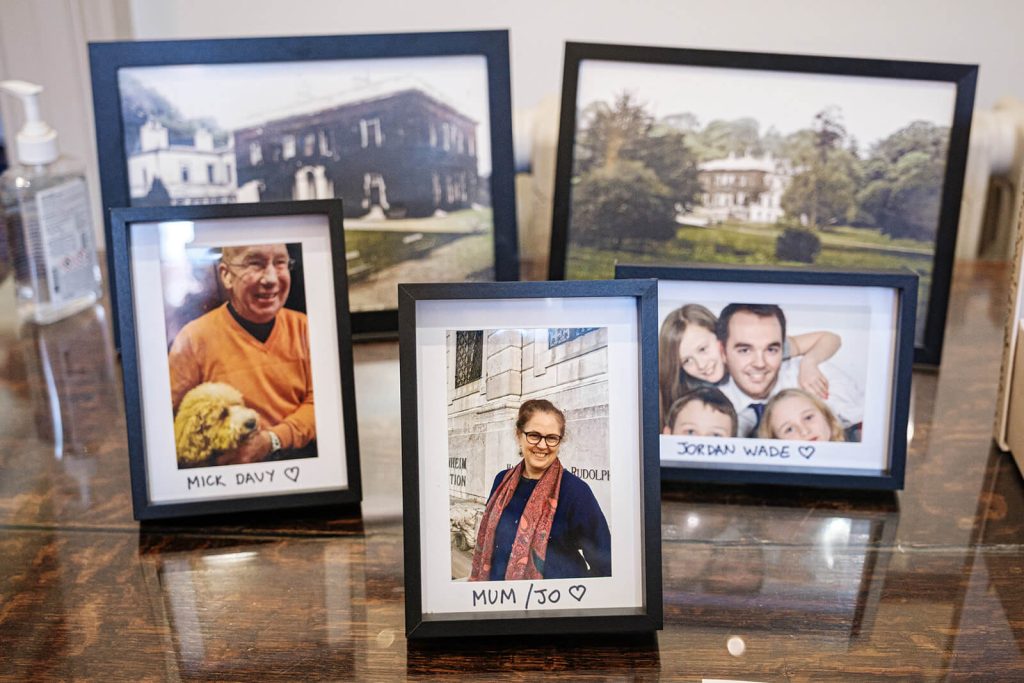 Family photos on a wooden table