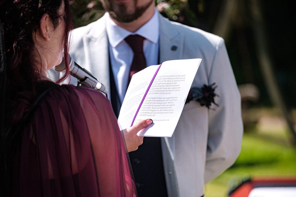 Woman reading during a ceremony