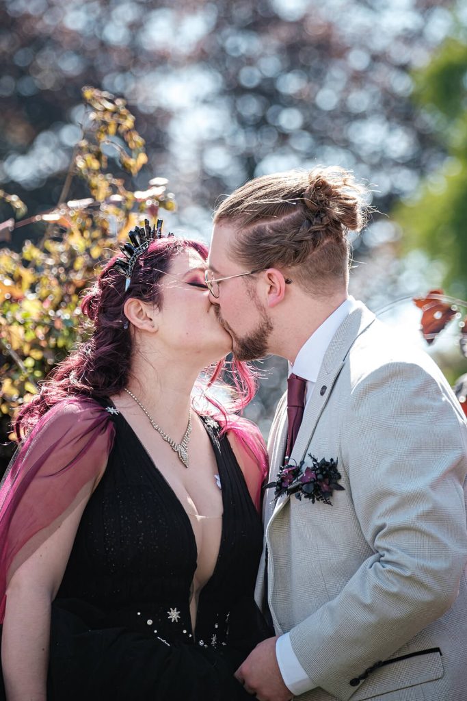 Couple sharing a romantic kiss.