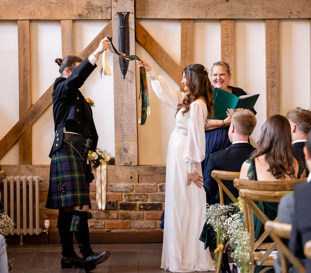 Miranda the Celebrant | Hampshire Ceremonies Couple exchanging vows during ceremony.