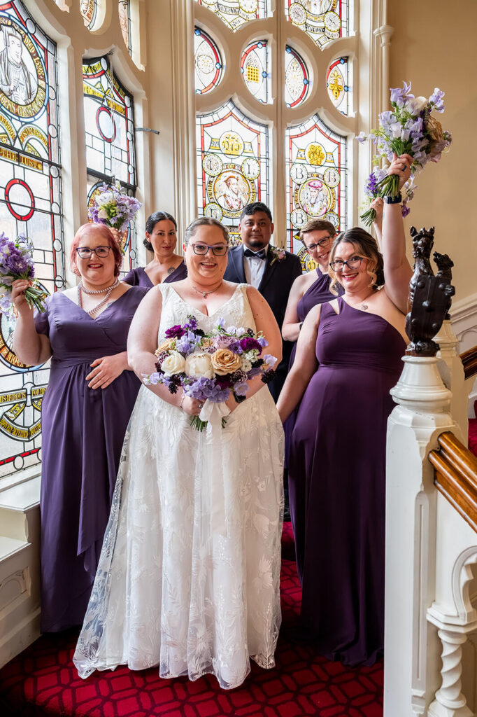 Miranda the Celebrant | Hampshire Ceremonies Bridal party posing with bouquets at The Elvetham