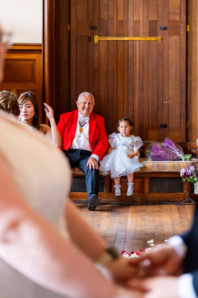 Miranda the Celebrant | Hampshire Ceremonies Man in red jacket, girl sitting.