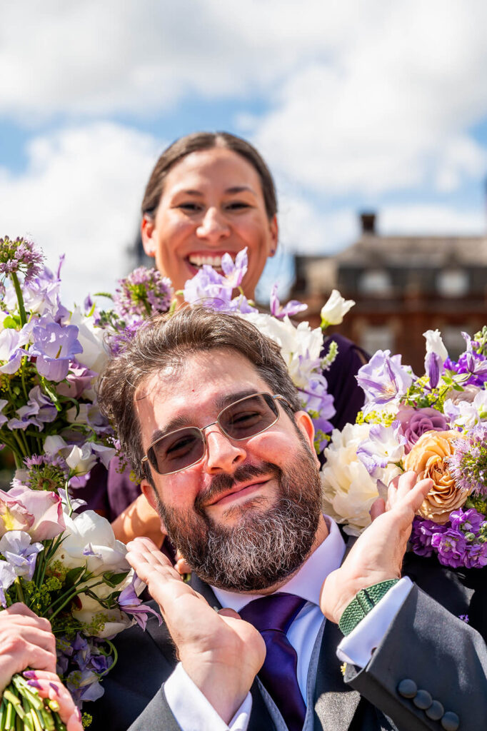 Miranda the Celebrant | Hampshire Ceremonies Man and woman with floral arrangements.
