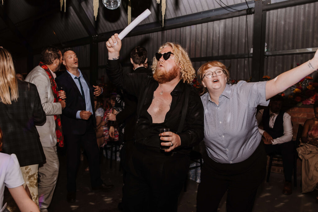 People dancing and celebrating at event