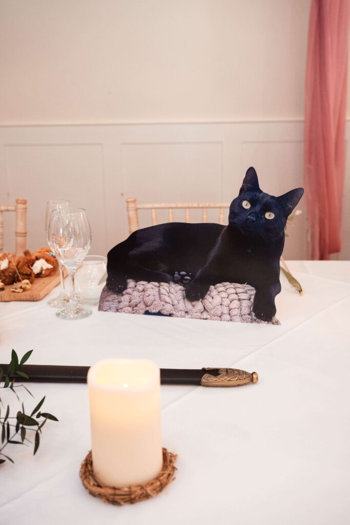 Miranda the Celebrant | Hampshire Ceremonies Cat figurine on a dining table