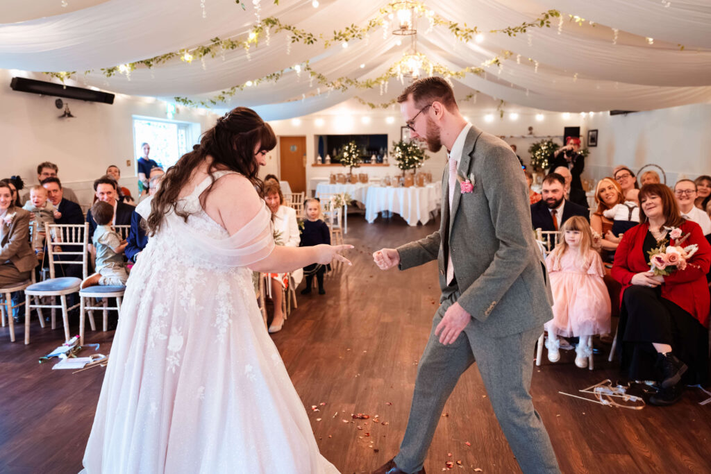 Miranda the Celebrant | Hampshire Ceremonies Couple exchanging vows at wedding ceremony.
