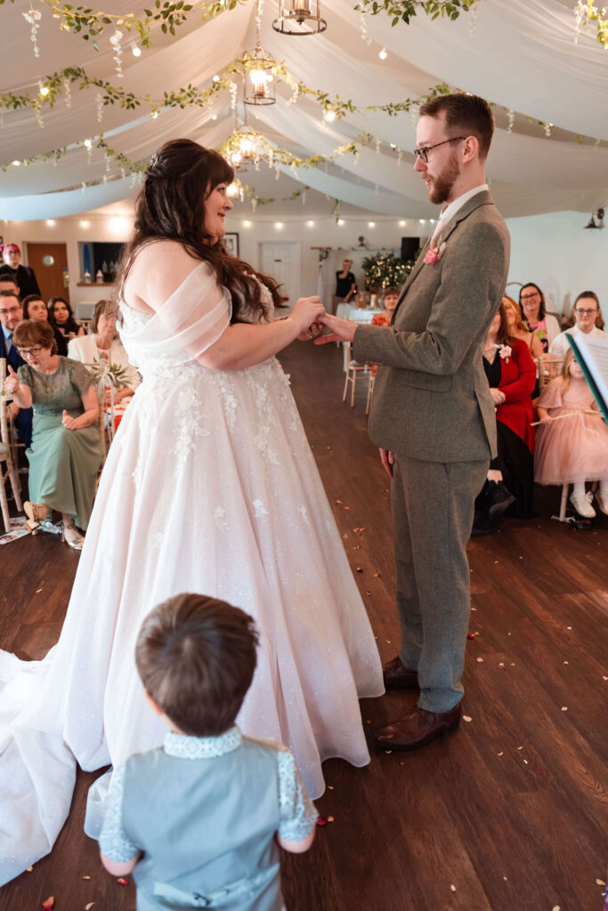 Miranda the Celebrant | Hampshire Ceremonies Couple exchanging vows at wedding ceremony.