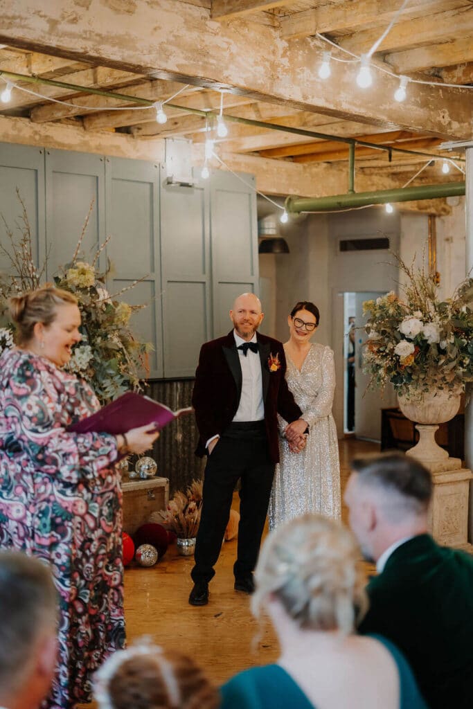 Colourful wedding ceremony with happy couple