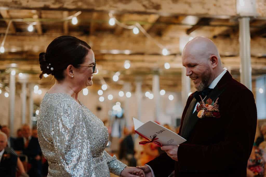 Couple exchanging vows in celebration.